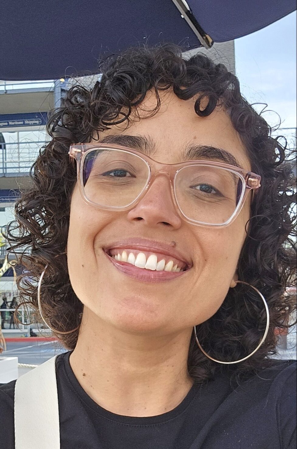 Headshot of Christina Cruz, Community Engagement Fellow